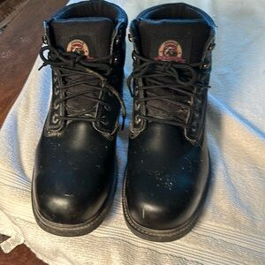 Steel toe boots. Cats sharpened their claws on them but not through the leather.